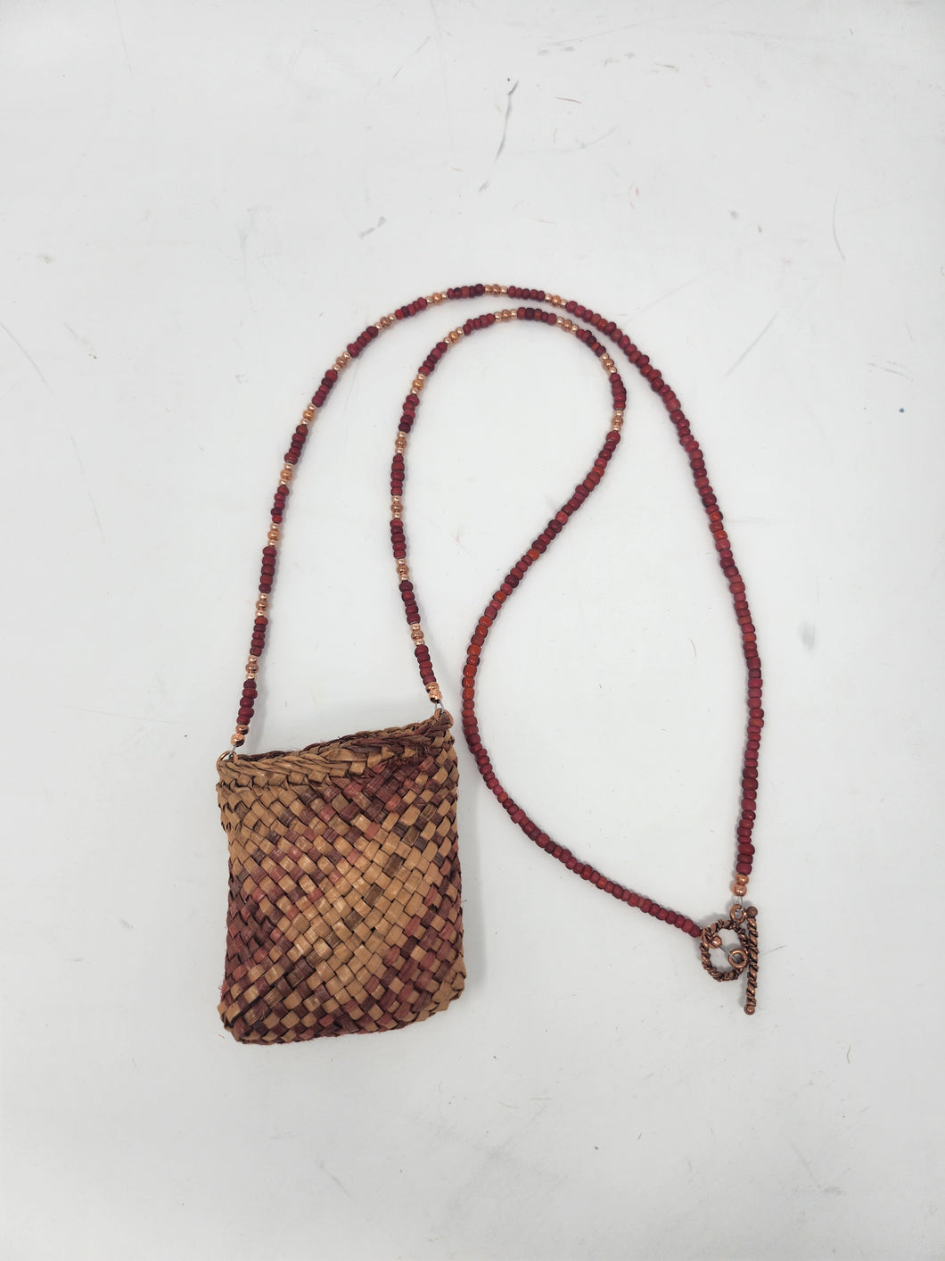 Small pouch w/red beads by Donna Cranmer